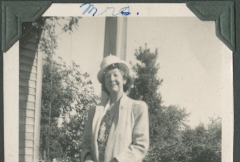 Suited woman standing (ddr-densho-321-17)