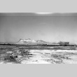 Ward 4 & 7 in the snow, Castle Rock in the background (ddr-densho-570-38)