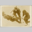 Two German medics bandaging a soldier's leg (ddr-njpa-13-882)