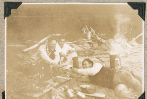 Three men resting at campsite (ddr-densho-383-65)