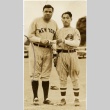 Babe Ruth holding a trophy with a player from the Waiakea Pirates (ddr-njpa-1-1380)