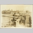 Naval officers inspecting an anti-aircraft gun on a ship (ddr-njpa-13-1088)