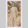 Takeo Isoshima in front of palm trees (ddr-densho-477-26)