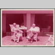 Man and woman on patio (ddr-densho-359-1160)