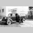 Man next to oyster delivery truck (ddr-densho-39-47)