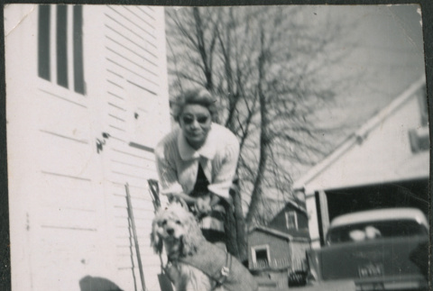 Agnes Sakura with dog (ddr-densho-523-295)