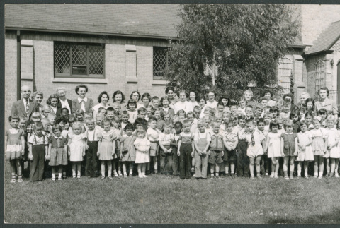 Large group photo of children and adults (ddr-densho-523-249)