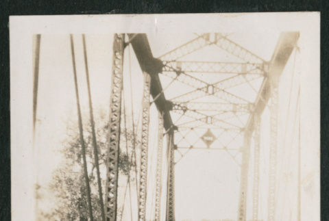 A young woman on a train bridge (ddr-densho-378-382)