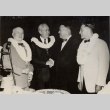 Ingram Stainback, Farrant L. Turner, Lawrence M. Judd, and Neal Blaisdell wearing leis (ddr-njpa-2-987)