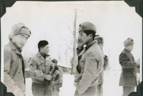 Three men standing in snow (ddr-ajah-2-467)