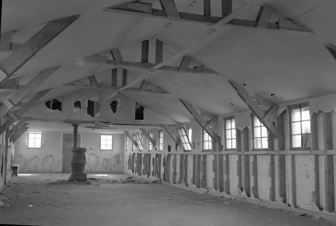 Interior of a barracks being renovated or demolished (ddr-fom-1-653)