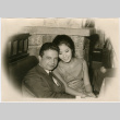 Man and women seated in restaurant (ddr-densho-426-815)