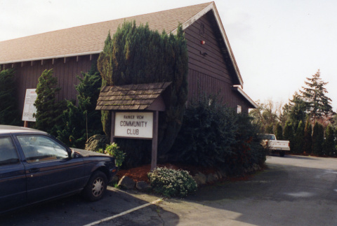 Front and side of office building with Rainier View Community Club sign (ddr-densho-354-681)