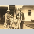 Kazue Kuwashima on board a ship with wife and sons (ddr-njpa-4-377)