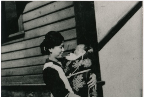 Mrs. Fujikoge and her first child (ddr-densho-353-191)