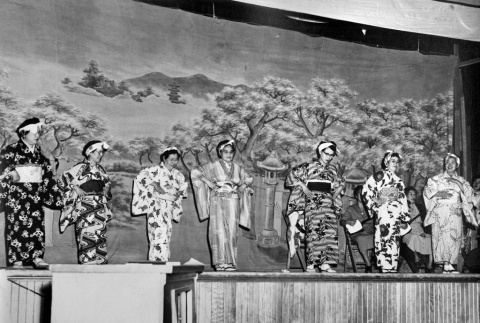 Seven women on stage in costume (ddr-ajah-3-320)
