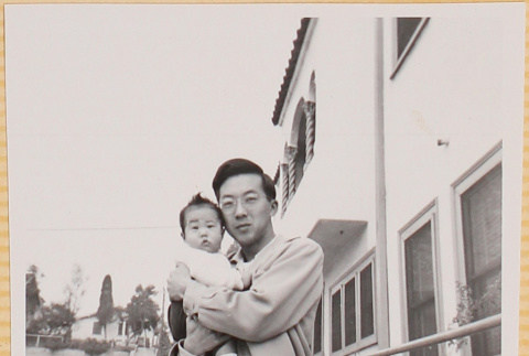 Hardy Shiomi holding Susan Shiomi (ddr-densho-522-161)