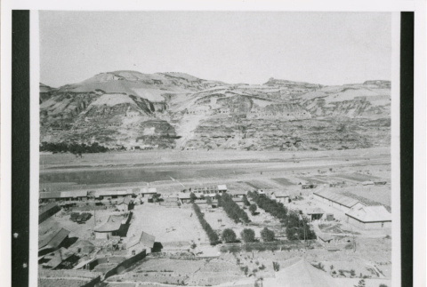 Aerial view of buildings and hills (ddr-densho-1007-187)