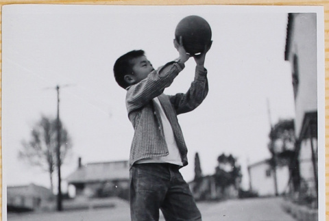 William Shiomi with ball (ddr-densho-522-300)