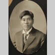 Portrait of Nikkei man in a suit (ddr-densho-259-442)