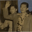 Chuck Mau and a man raising his hand (ddr-njpa-2-683)