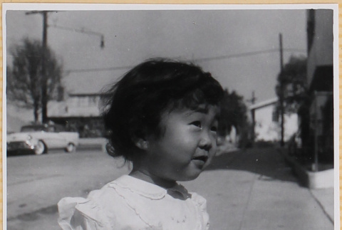 Susan Shiomi eating a banana (ddr-densho-522-310)