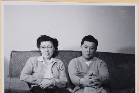 Couple sitting on couch (ddr-densho-522-541)