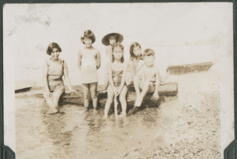 Woman with five children swimming (ddr-densho-355-566)