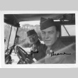 [Two men in military uniform in military vehicle] (ddr-csujad-1-18)