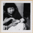 Leslie Shiomi being bottle fed (ddr-densho-522-344)