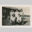 A group standing in front of barracks (ddr-densho-296-101)