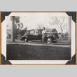 Man leaning against car (ddr-densho-542-163)