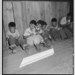 Japanese Americans in makeshift classroom (ddr-densho-151-368)