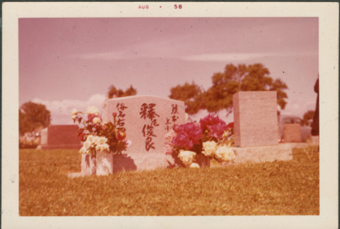 Color photo of grave marker, inscription in Japanese (ddr-densho-293-187)