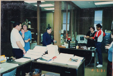 Five people working in office (ddr-densho-426-1198)