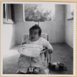 Susan Shiomi in stroller (ddr-densho-522-145)