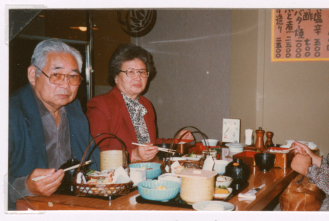 Family meal in Tokyo (ddr-densho-477-502)