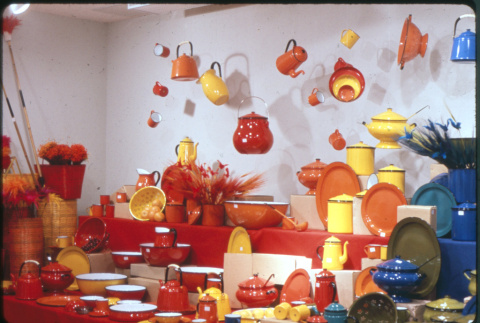 Display of yellow, orange and red enamel and lacquerware (ddr-densho-426-363)