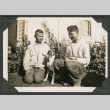 Photo of two men and a dog (ddr-densho-483-222)