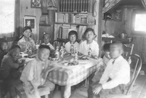 Children sitting around a table (ddr-densho-107-16)
