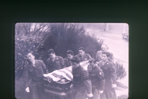 (Slide) - Image of nine men carrying coffin with American Flag (ddr-densho-330-232-master-fc5aa7d345)