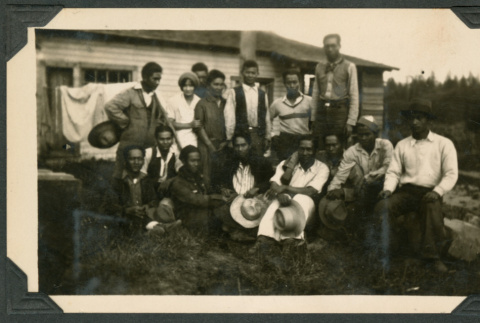 Group photo outside a house (ddr-densho-483-193)