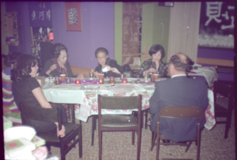 Group seated at a table (ddr-densho-426-609)
