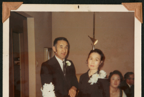 Walter and Kazuko Matsuoka cut their wedding cake (ddr-densho-390-106)
