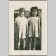 Two girls holding hands (ddr-densho-316-417)