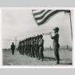 Bugler Pfc. Chales Kimura plays taps at memorial service (ddr-densho-1007-148)