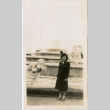 Tomoye Nozawa standing in front of fountain (ddr-densho-423-473)