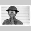 Toshikuni Taenaka in US Army uniform with gas mask (ddr-csujad-25-70)