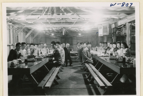 News Courier staff having a meal (ddr-densho-37-1912)