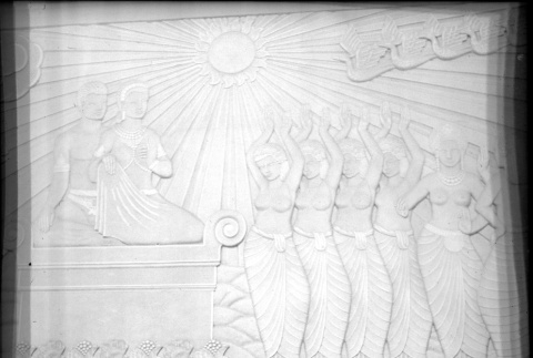 Woman seated in front of bas-relief sculpture (ddr-densho-426-1650)